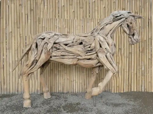 Product image of the product “Horse in one piece, the head is from one piece of wood and carved head. The size is sbout 240cm lenght and 165cm height. ”